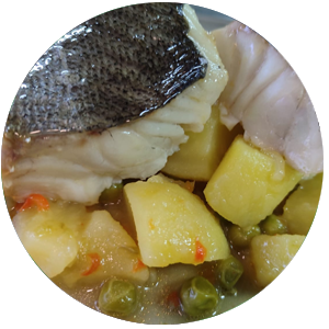 Merluza con guisantes